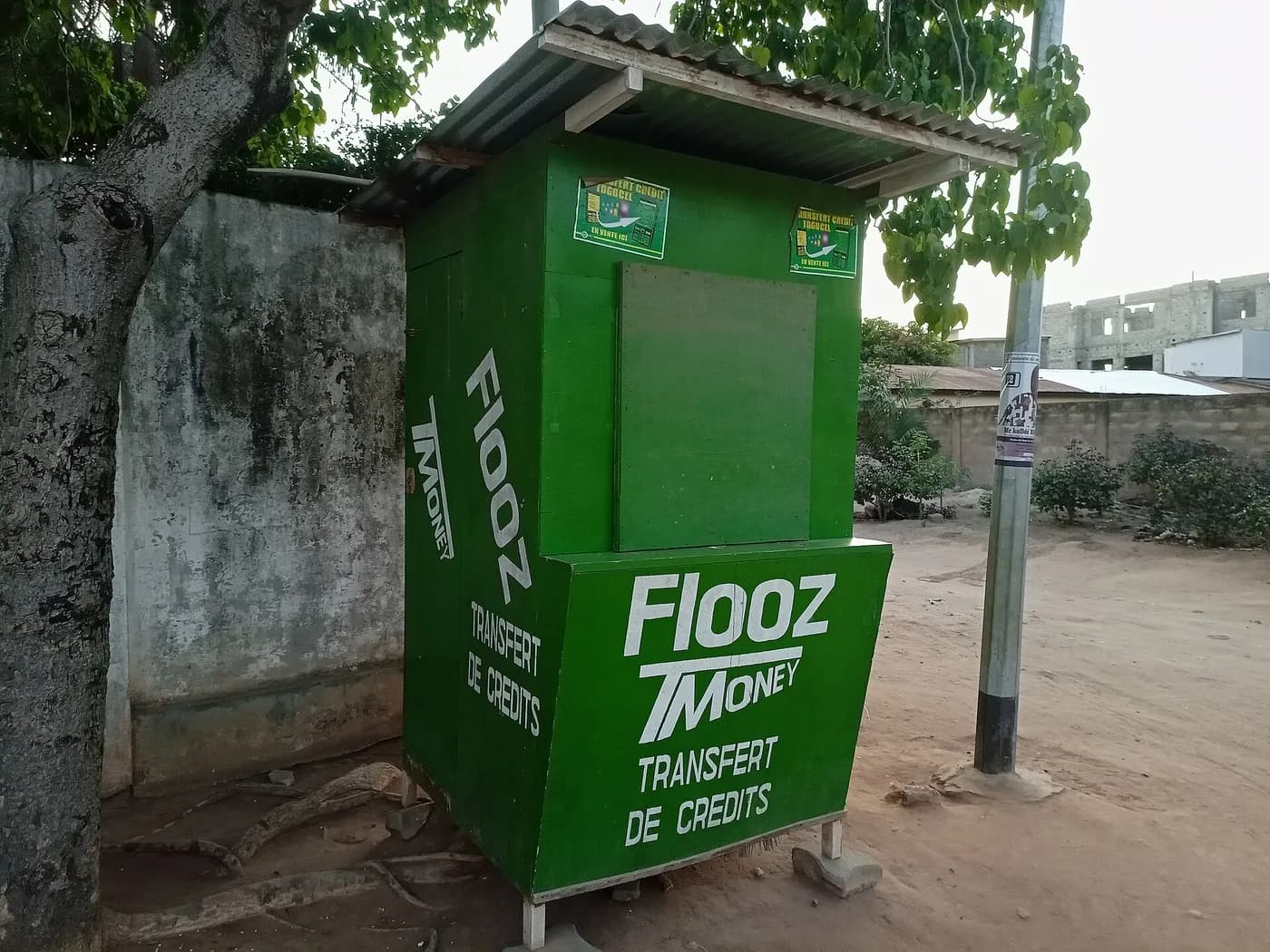 A mobile money kiosk in Lomé, Togo. Across West Africa, the small cash-out point is still many people’s first contact with mobile payments.
